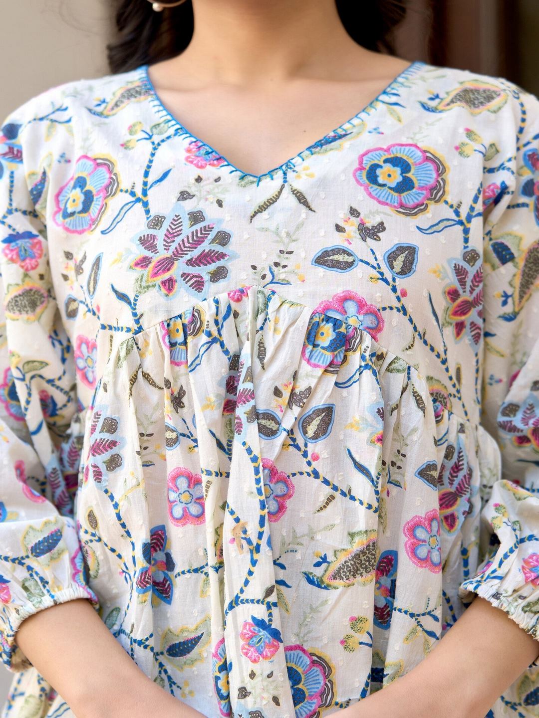 Off-White Printed V-Neck Peplum Tunic