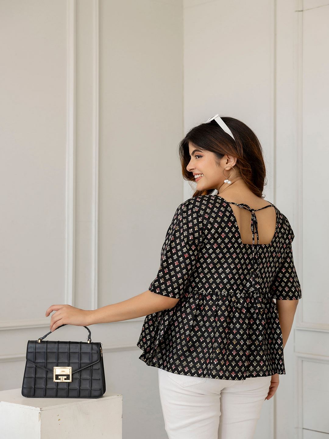 Black Printed V-Neck Peplum Tunic