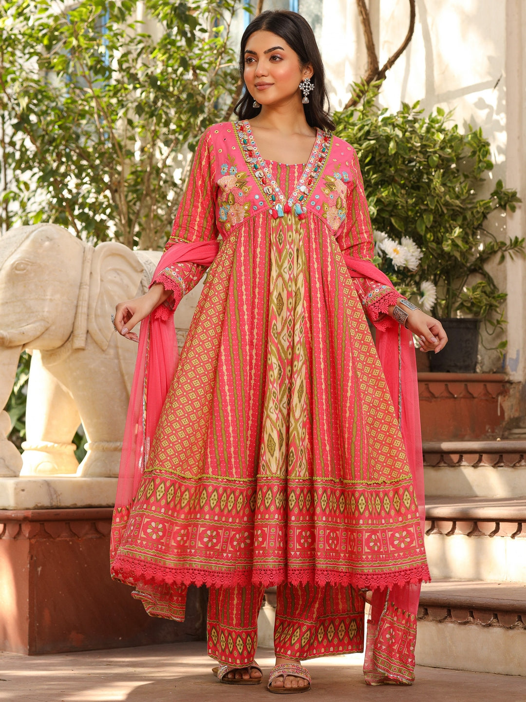 Green Pure Cotton Ikat Printed Alia Cut Anarkali Kurta Set With Tassels & Thread Embroidery