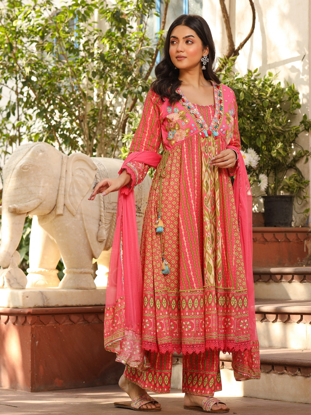 Green Pure Cotton Ikat Printed Alia Cut Anarkali Kurta Set With Tassels & Thread Embroidery