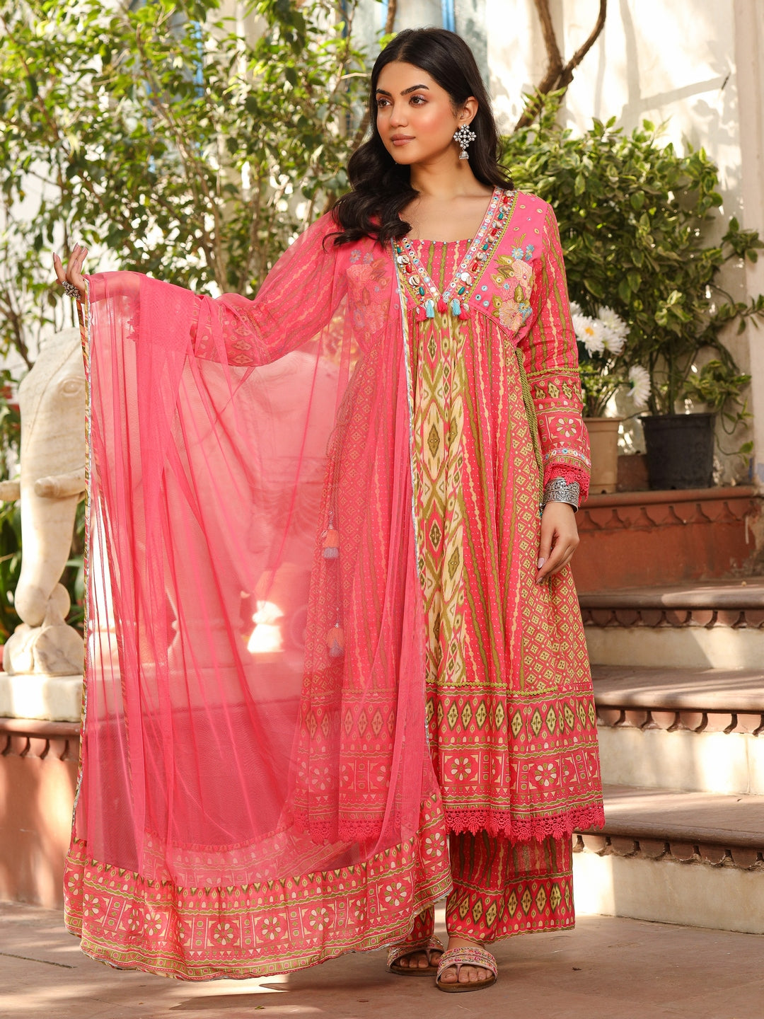 Green Pure Cotton Ikat Printed Alia Cut Anarkali Kurta Set With Tassels & Thread Embroidery