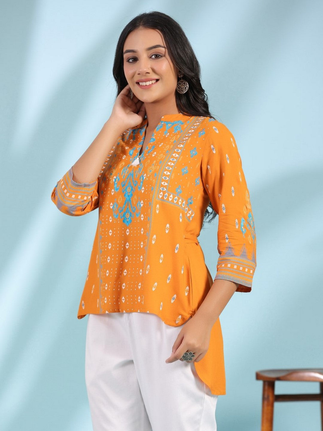 Mustard Rayon Ikat Placement Printed High-Low Tunic With Side Slits & Tassels