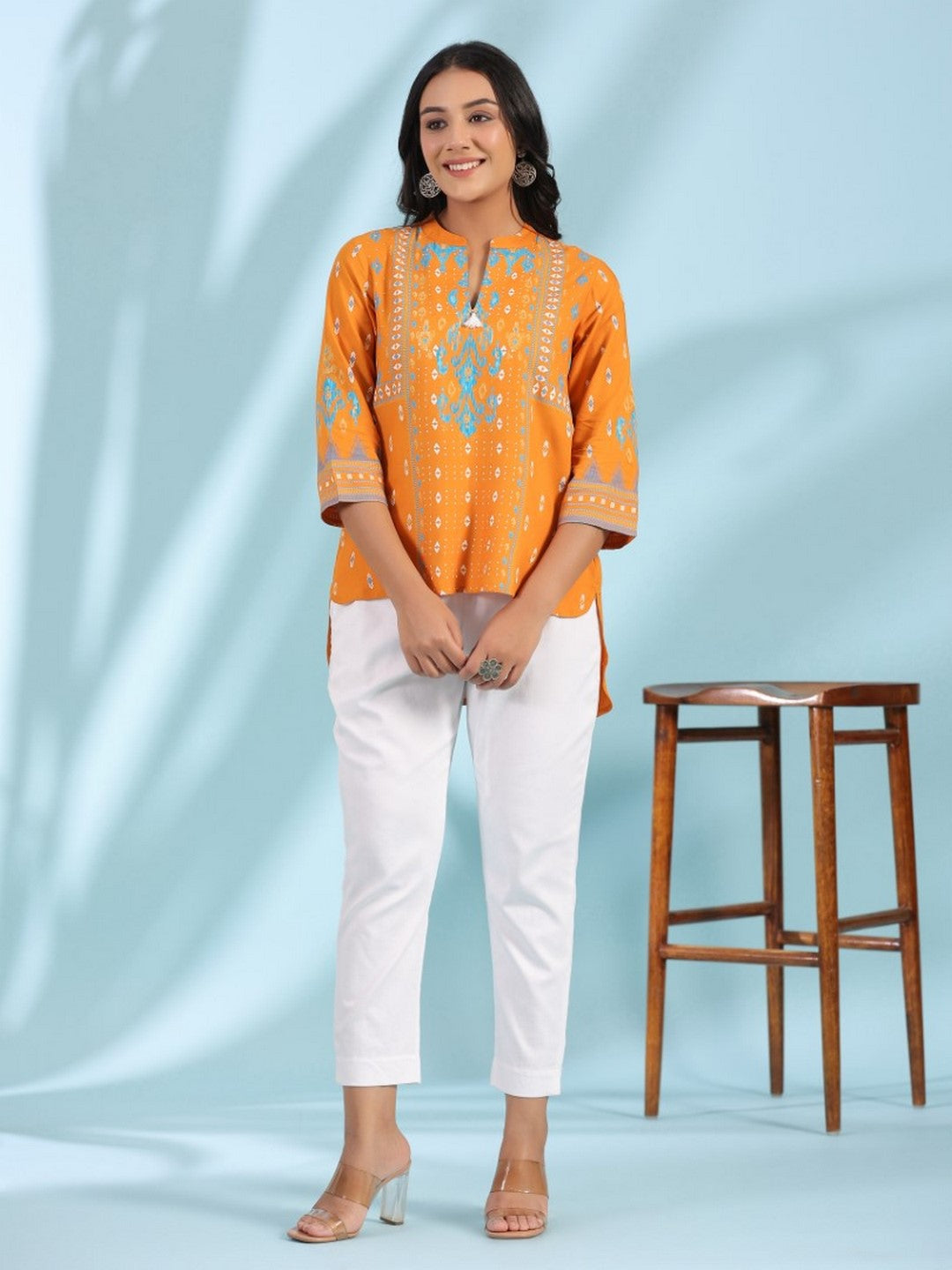 Mustard Rayon Ikat Placement Printed High-Low Tunic With Side Slits & Tassels