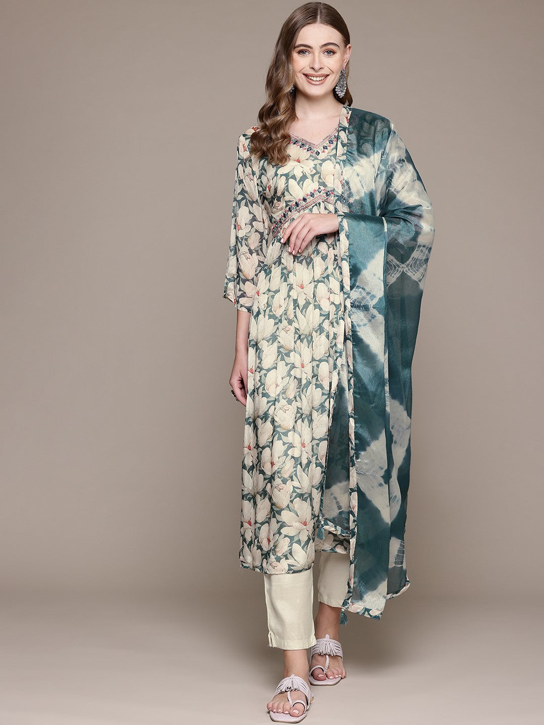 Flared Style Silk Fabric Cream Color Kurta With Bottom And Dupatta