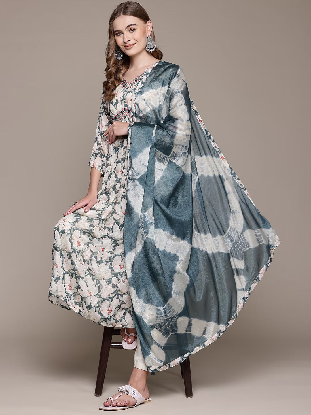 Flared Style Silk Fabric Cream Color Kurta With Bottom And Dupatta