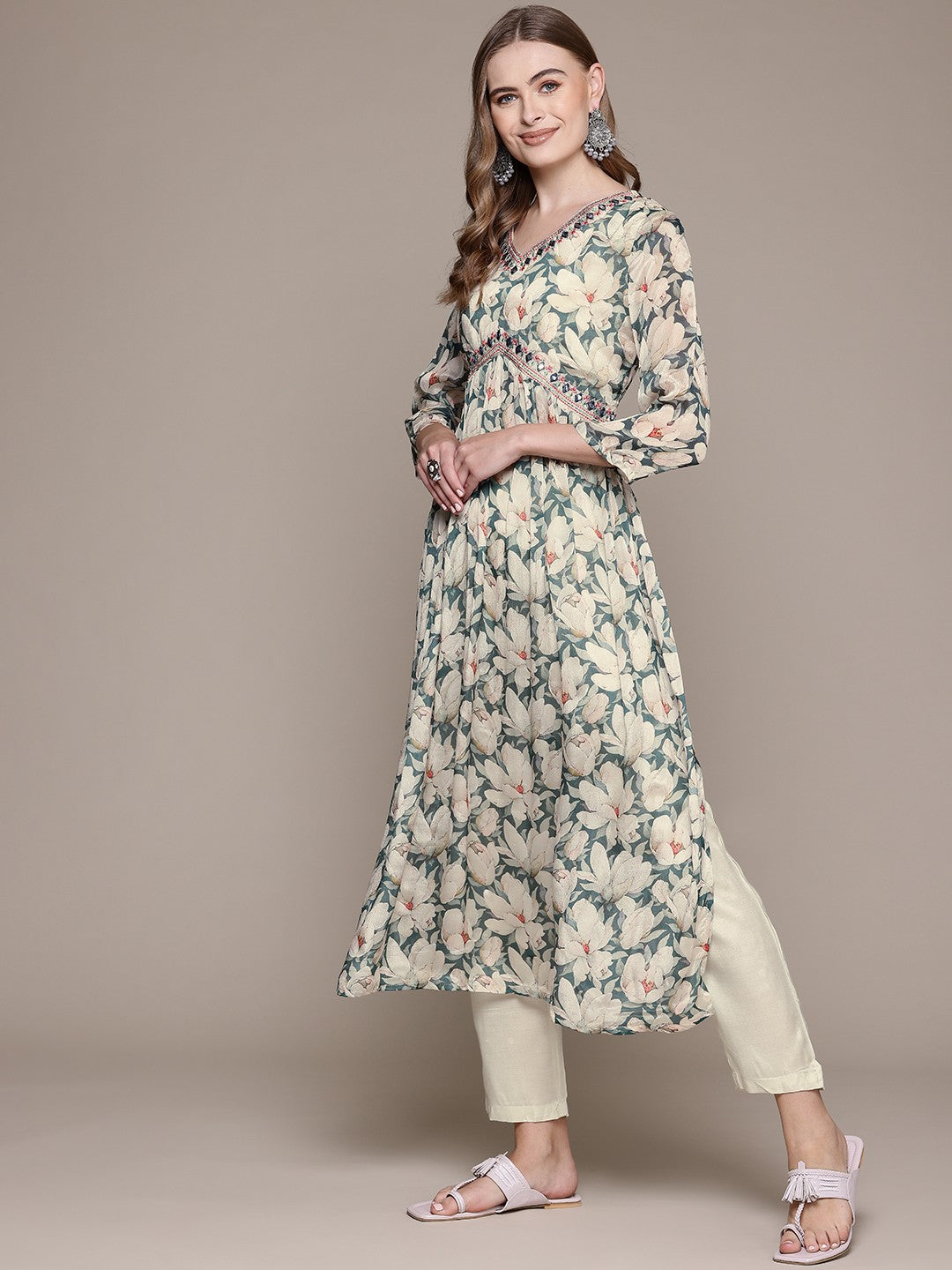 Flared Style Silk Fabric Cream Color Kurta With Bottom And Dupatta