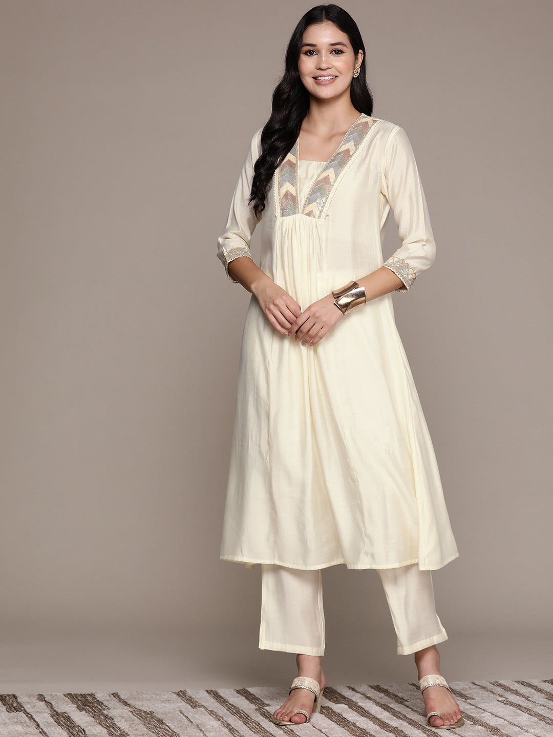 A Line Style Silk Fabric Cream Color Kurta And Bottom