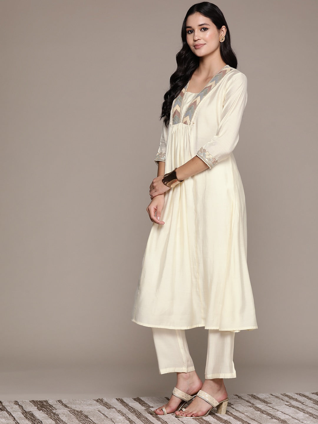 A Line Style Silk Fabric Cream Color Kurta And Bottom