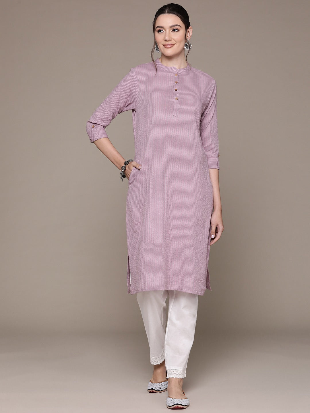 Aline Style Cotton Fabric Mauve Color Kurta With Weaved Work