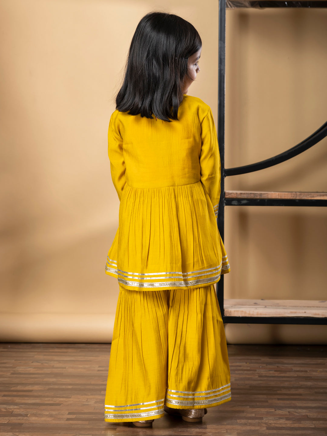 Girls Peplum Style Roman Silk Fabric Yellow Color Kurti With Sharara
