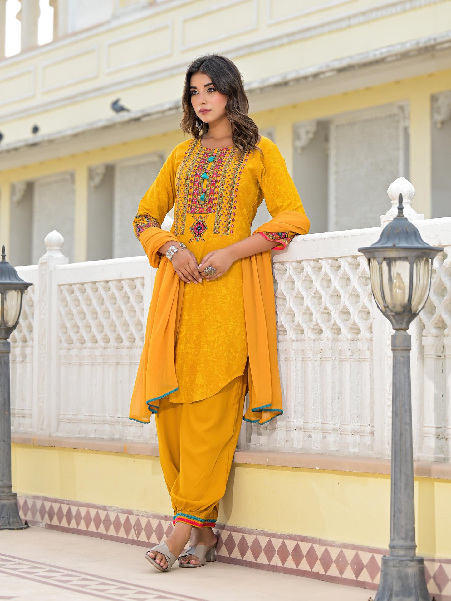 Mustard Ethnic Motif Printed Kurta, Pant And Dupatta Set With Tassels & Buttons.