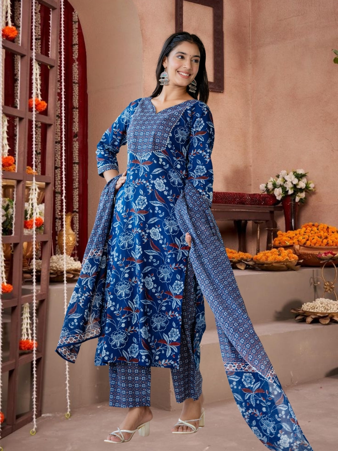 Blue Floral Printed Cotton Kurta Set With Geometric Yoke & Dupatta.
