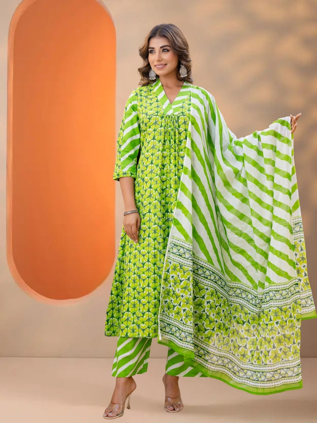 Green Printed A-Line Kurta Set With Striped Pants & Dupatta.