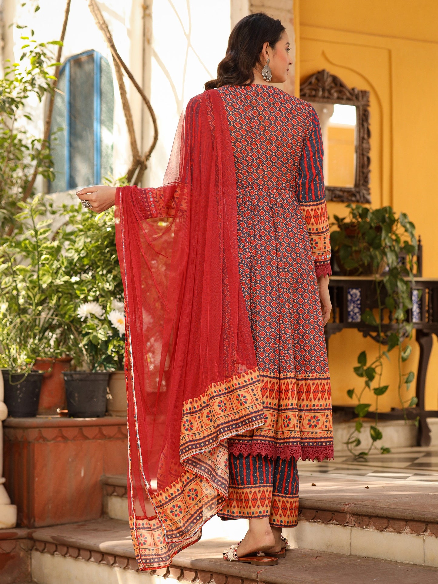 Rust Pure Cotton Ikat Printed Alia Cut Anarkali Kurta Set With Tassels & Thread Embroidery