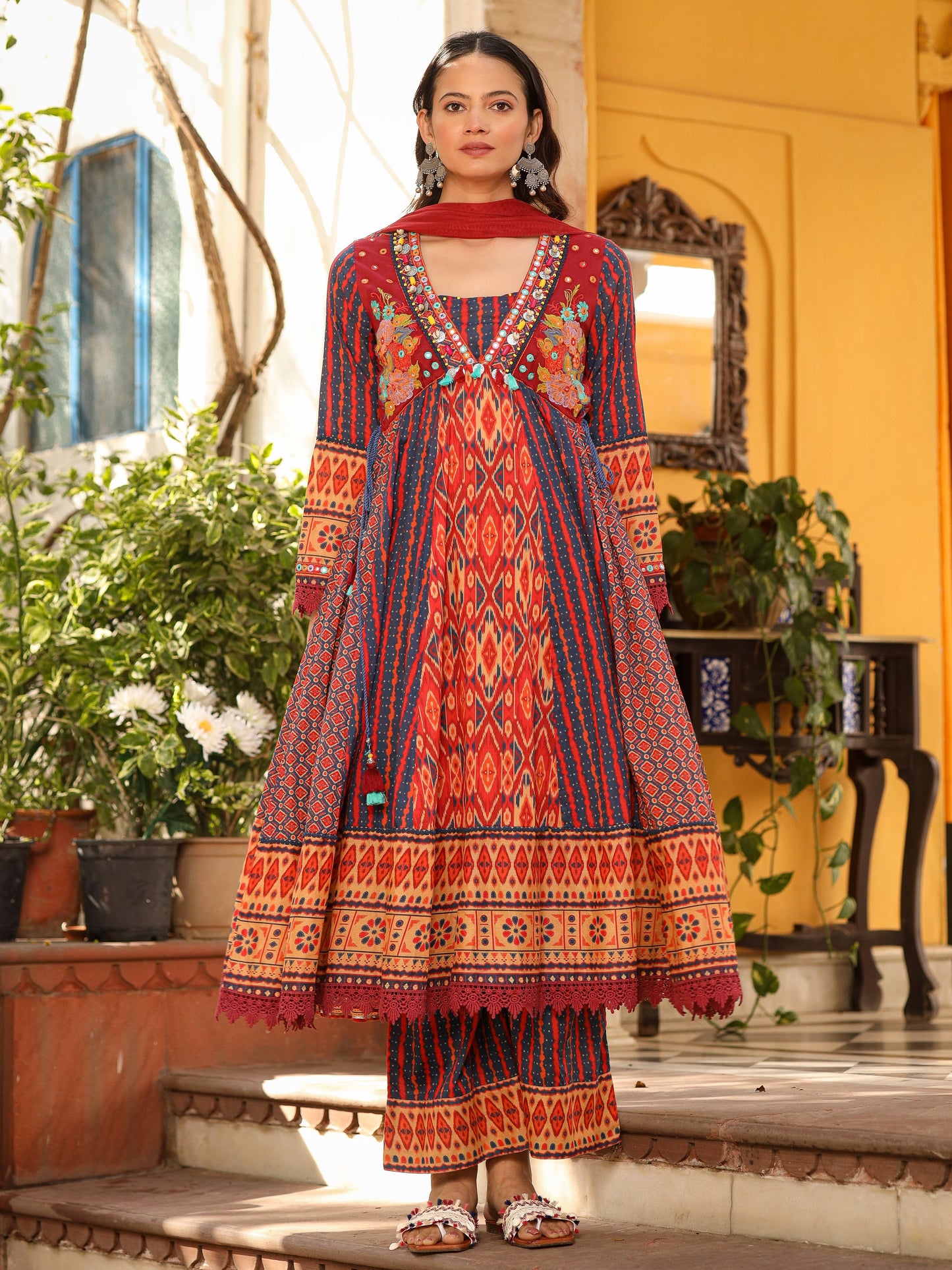 Rust Pure Cotton Ikat Printed Alia Cut Anarkali Kurta Set With Tassels & Thread Embroidery