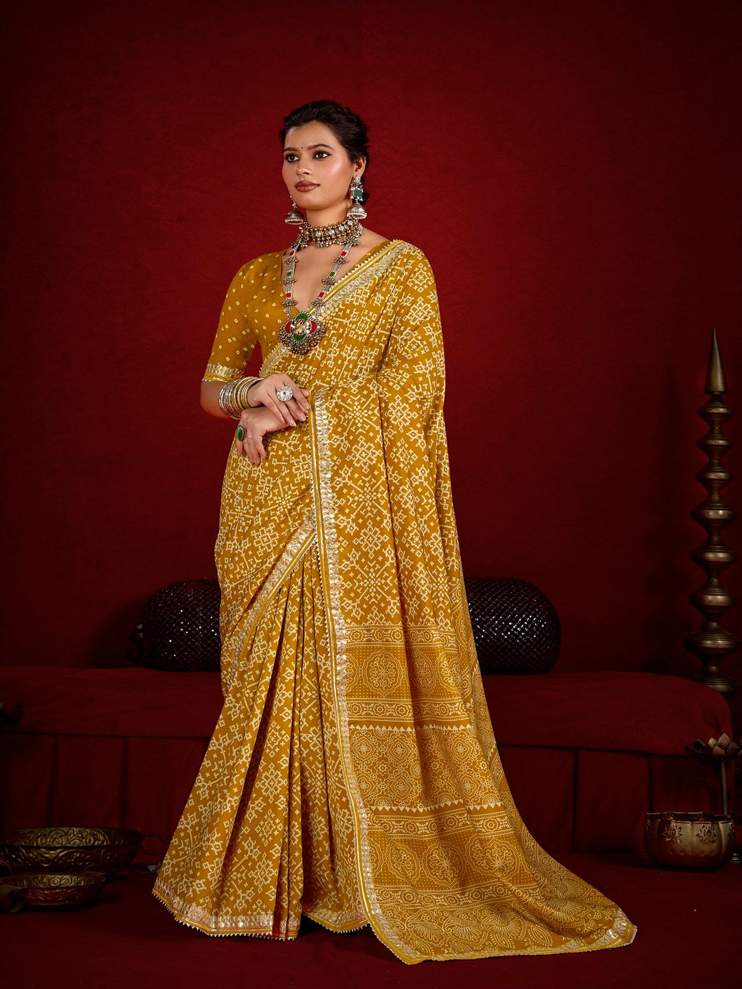 Mustard Patola Printed Silk Blend Saree With Unstitched Blouse Piece