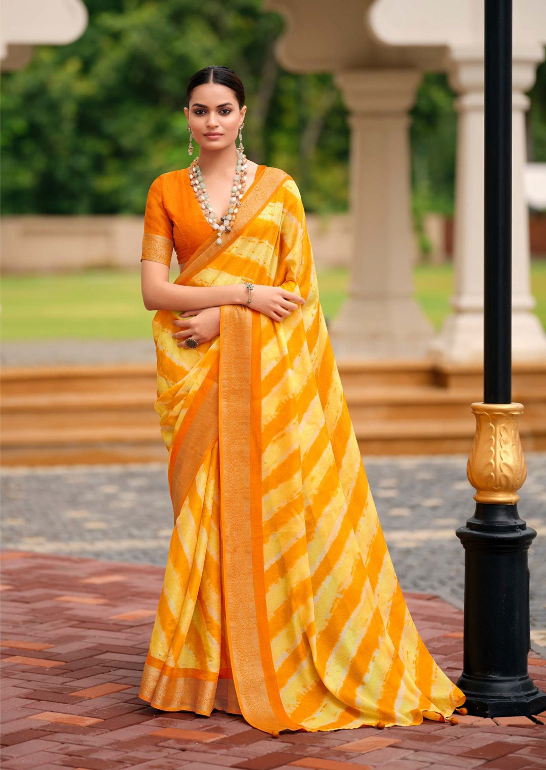 Yellow Leheriya Printed Silk Blend Saree With Unstitched Blouse