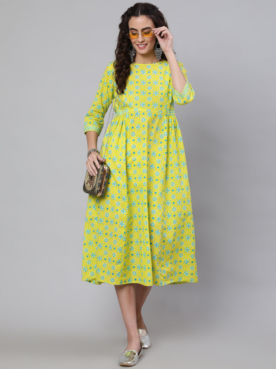 Yellow Ethnic Printed Flared Dress With Three Quarter Sleeves