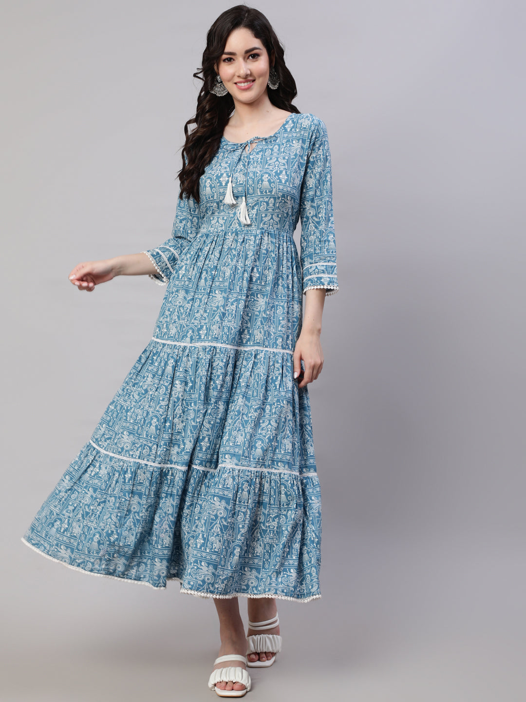 Blue Ethnic Printed Tired Dress With Tie Up Neck