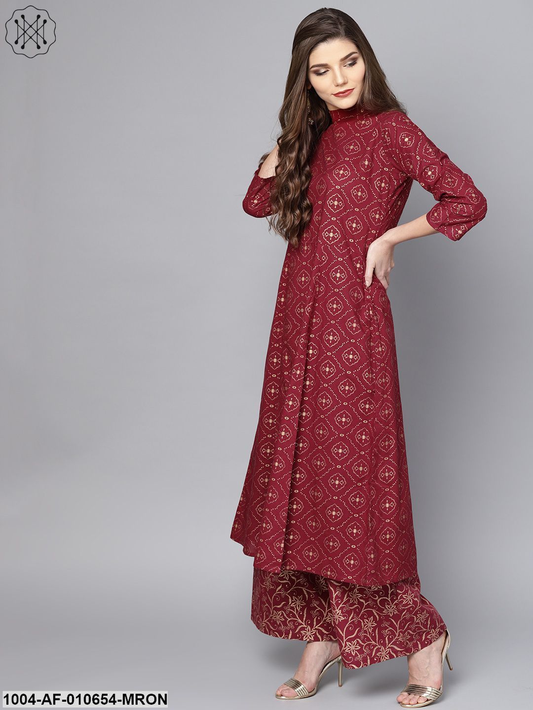 Women Maroon Three-Quarter Sleeves Round Neck A-Line Pure Cotton Kurta Trendphoria Women Maroon Three-Quarter Sleeves Round Neck A-Line Pure Cotton Kurta Trendphoria