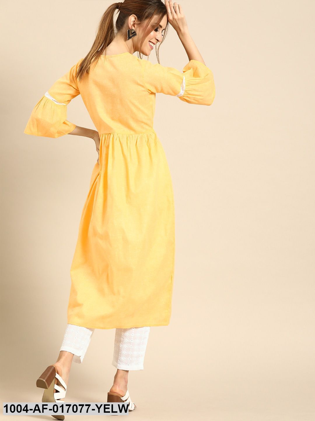 Pastel Yellow Three-Quarter Sleeves Solid Flared Pure Cotton Kurta with Schiffli Trouser