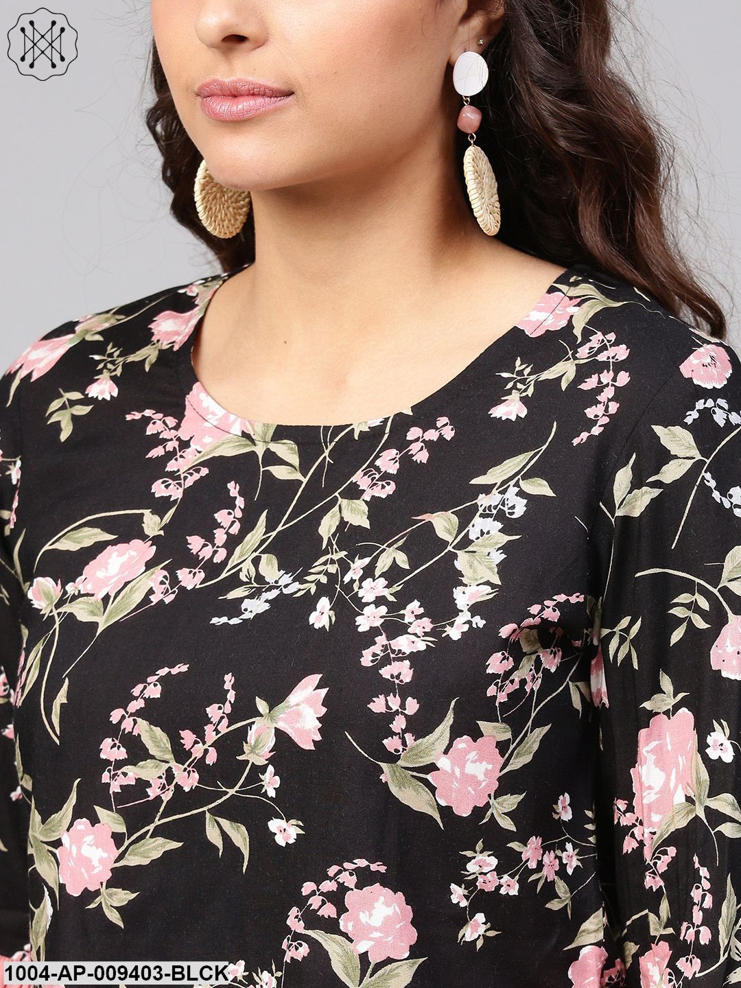 Solid Black Based Multi Floral Prints With A Round Neck And Flared Sleeves