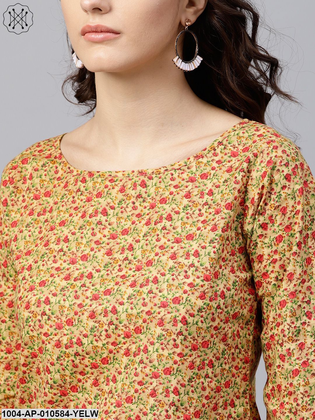 Multi Printed Top With Round Neck And 3/4 Flared Sleeves