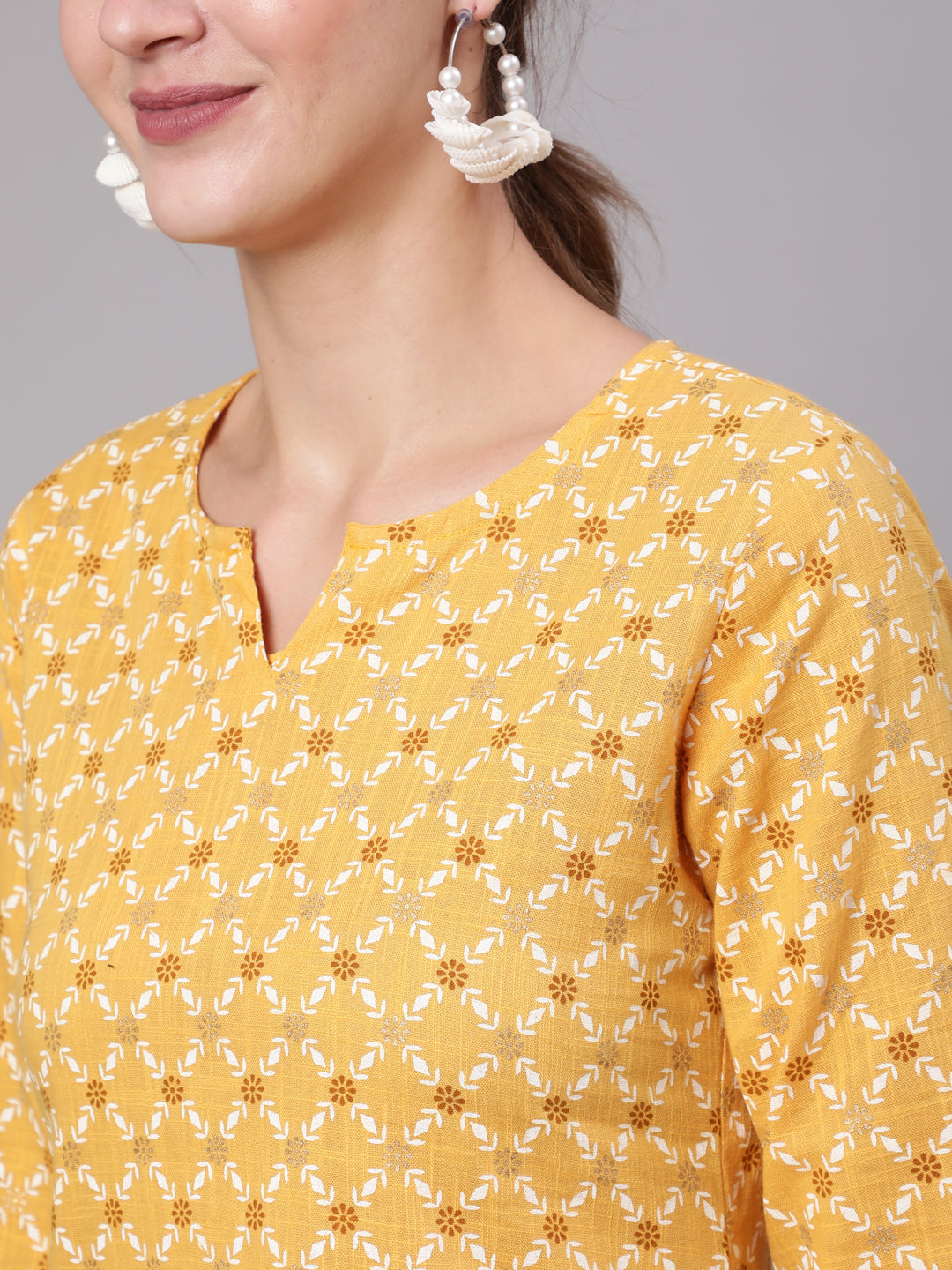 Yellow Printed Straight Tunic With Three Quarter Sleeves