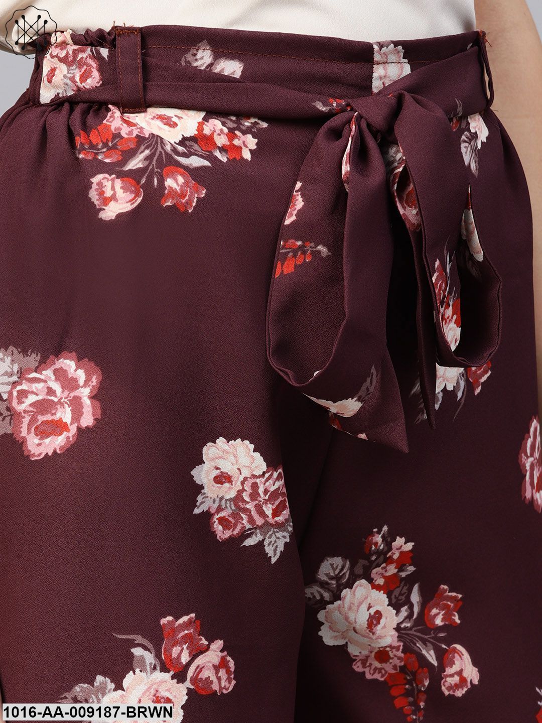 Solid V-Neck Sleevles Top With Floral Printed High -Waisted Ruffled Waistband Attached With A Belt Palazzo Pants