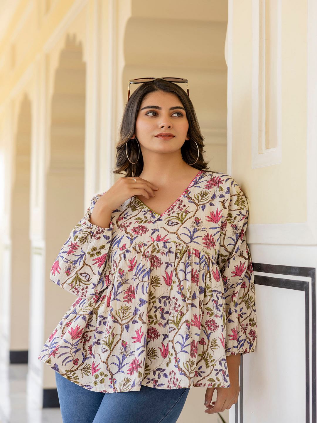 Off White Printed V-Neck Peplum Tunic