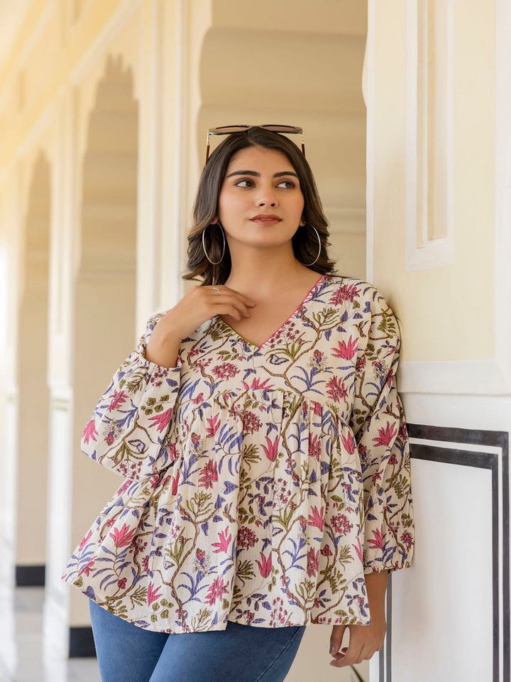 Off White Printed V-Neck Peplum Tunic