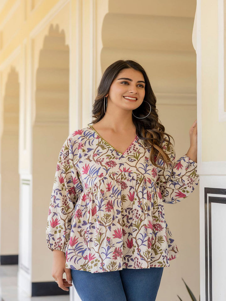 Off White Printed V-Neck Peplum Tunic