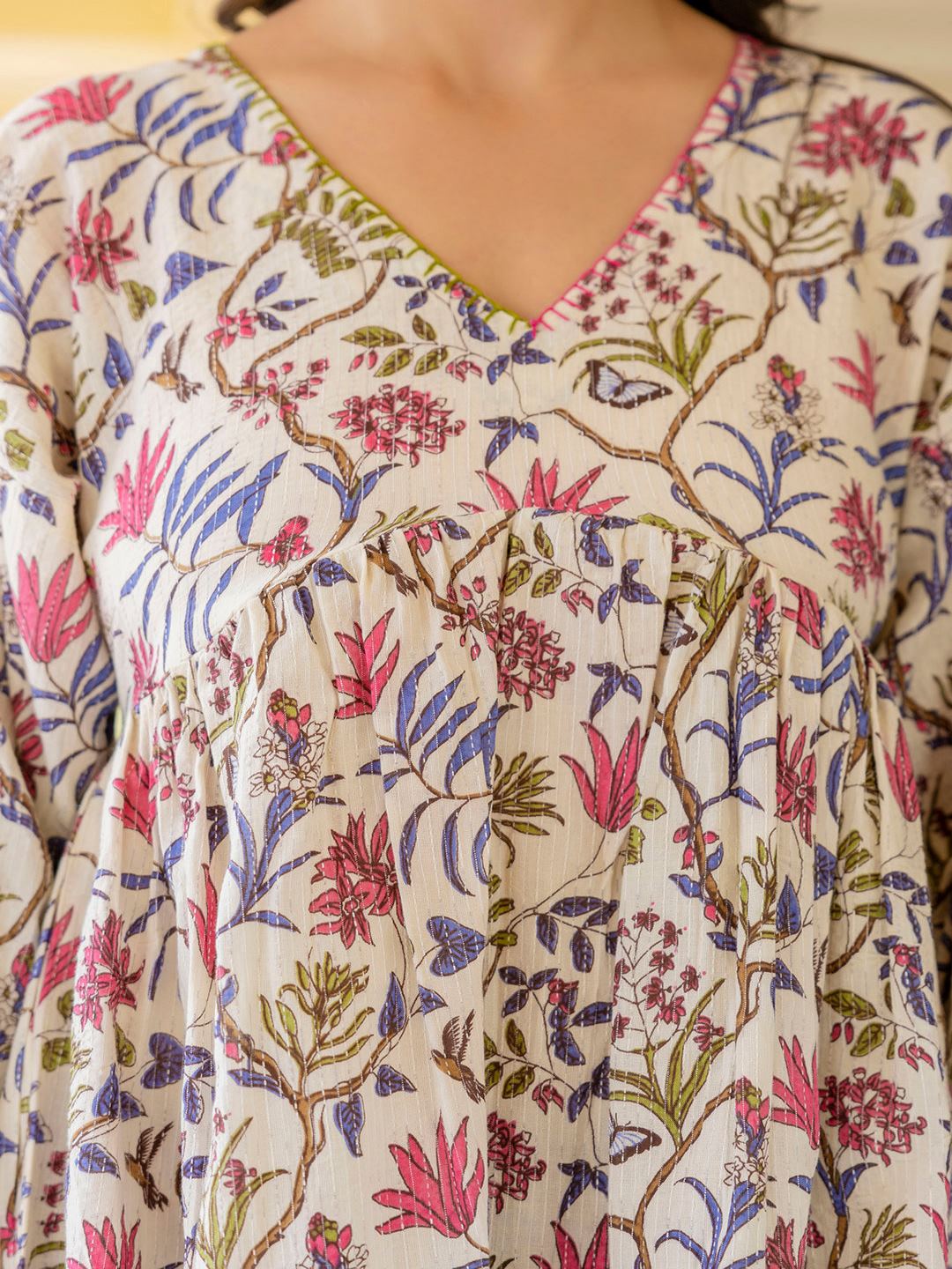 Off White Printed V-Neck Peplum Tunic