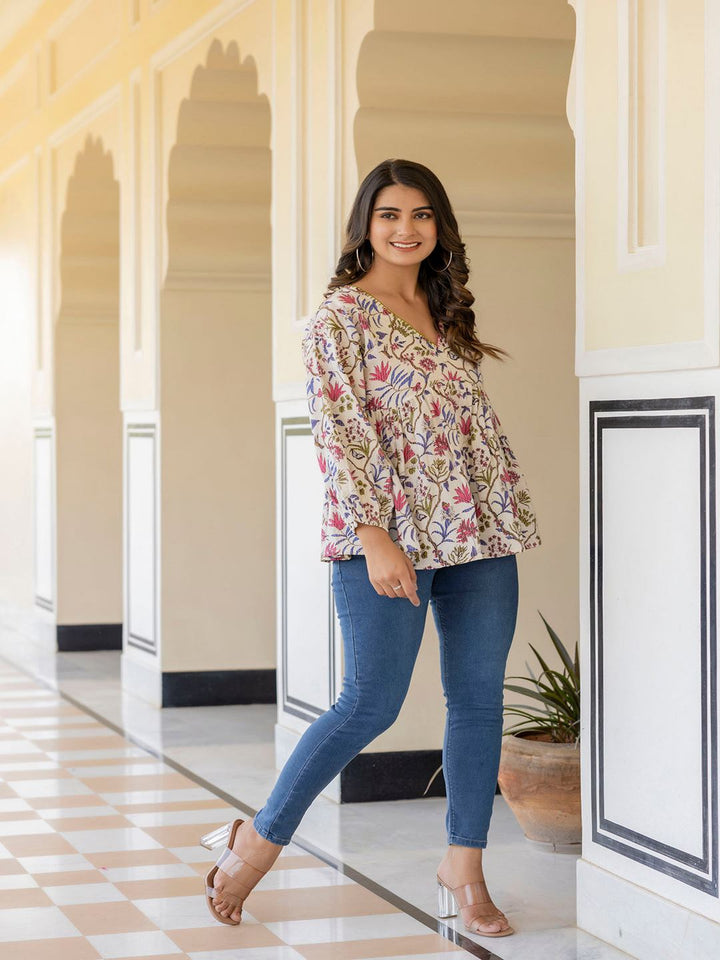 Off White Printed V-Neck Peplum Tunic