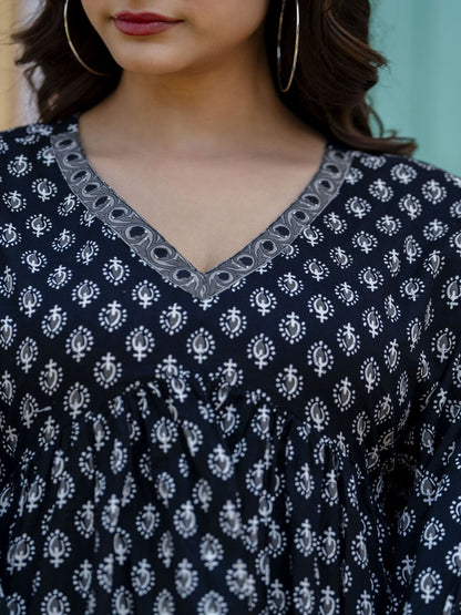 Black Printed V-Neck Peplum Top