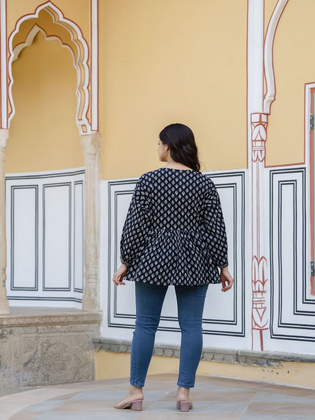 Black Printed V-Neck Peplum Top