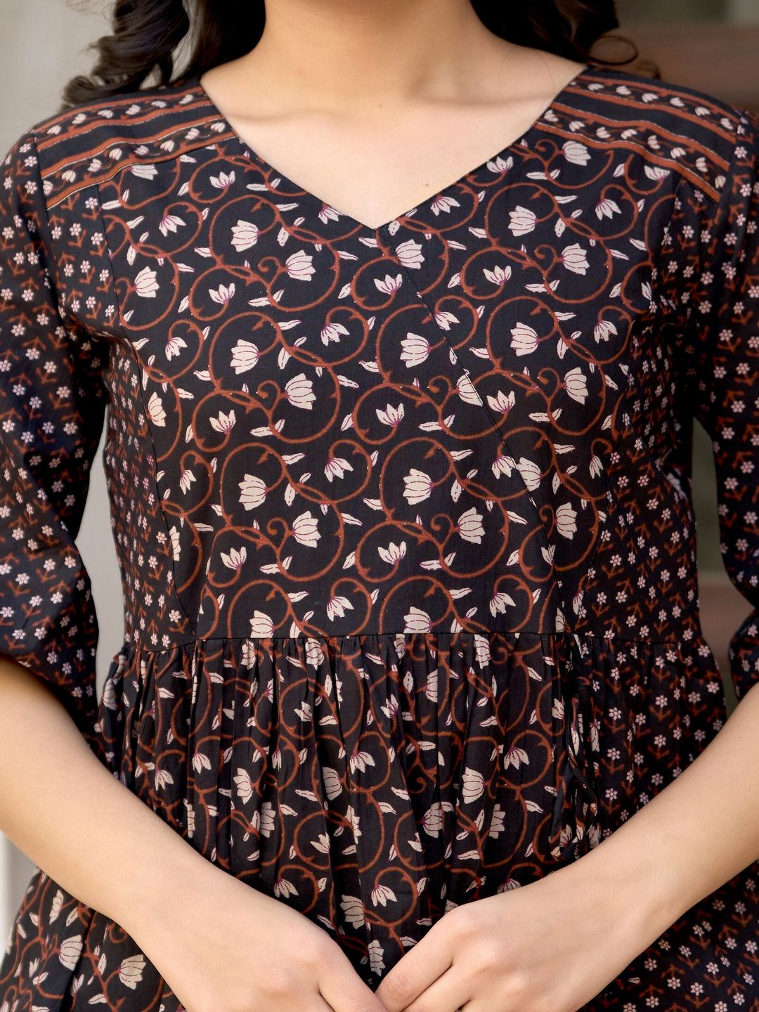 Black Printed V-Neck Peplum Tunic