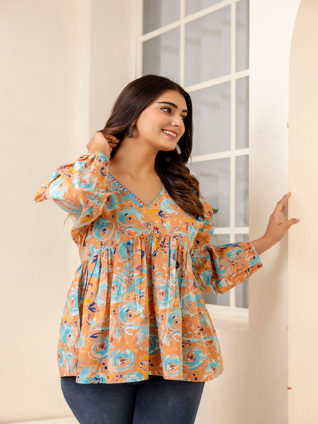 Multi Printed Peplum Tunic
