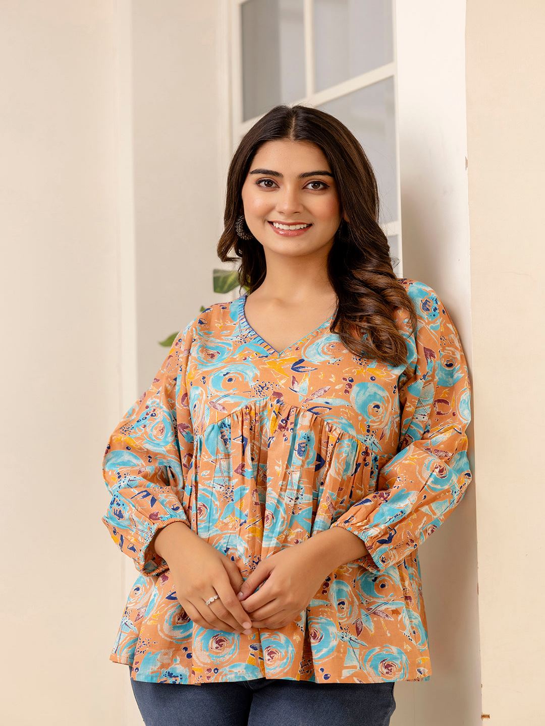 Multi Printed Peplum Tunic