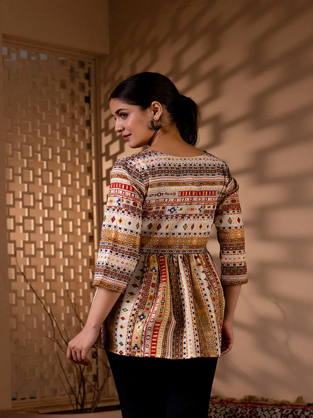 Multi Printed Peplum Tunic