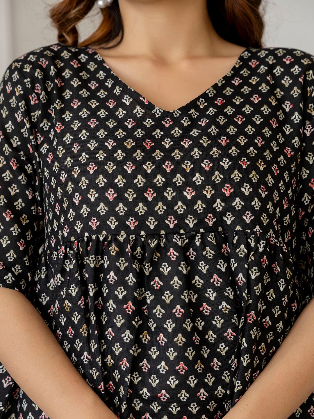 Black Printed V-Neck Peplum Tunic