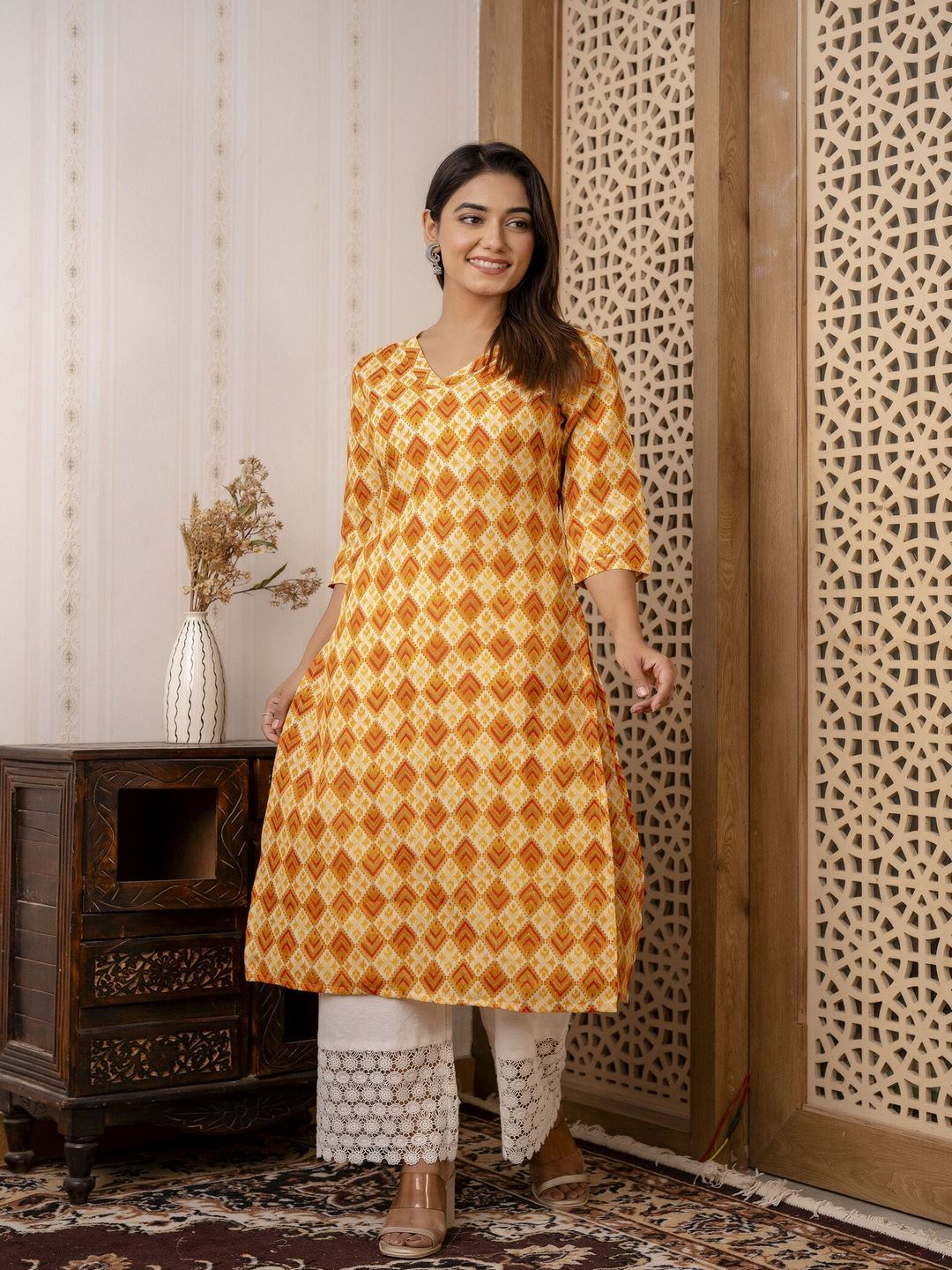 Yellow Printed Straight Kurta With Three Quarter Sleeves