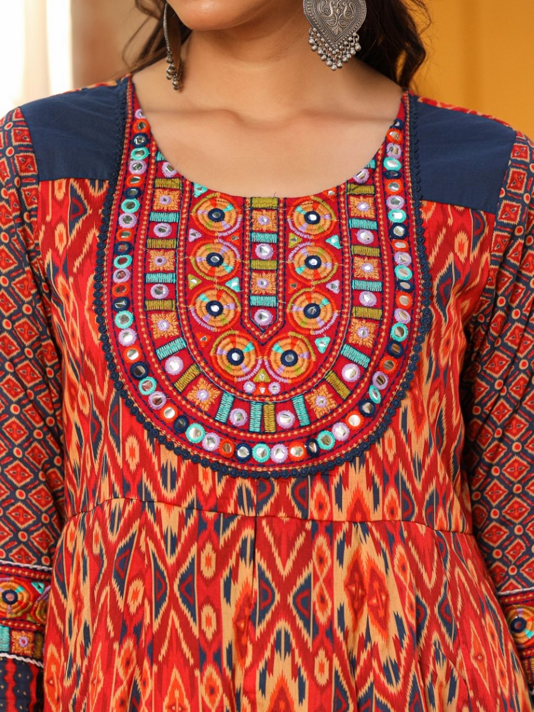 Rust Cotton Ikat Printed Layered Maxi Dress With Thread Embroidery & Dori Tassel Tie-Up At Waist