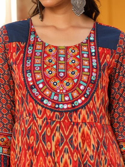 Rust Cotton Ikat Printed Layered Maxi Dress With Thread Embroidery & Dori Tassel Tie-Up At Waist