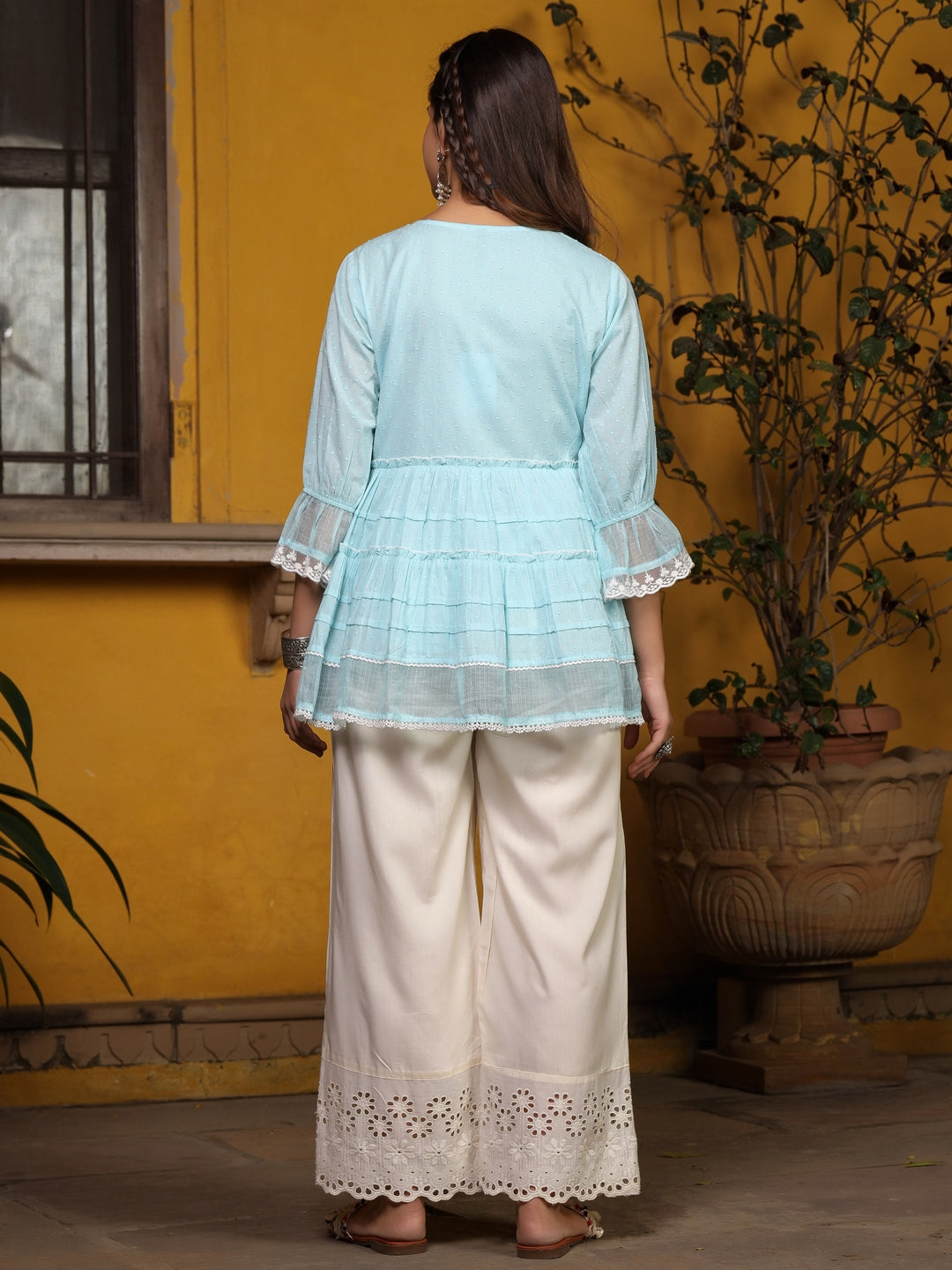 Sky Blue Solid Peplum Lacy Keyhole Neckline Tunic With Lining
