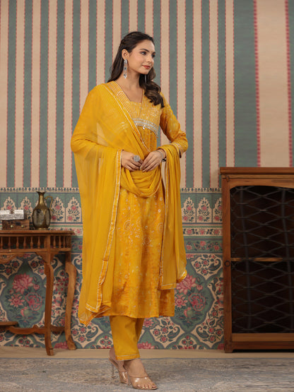 Anarkali Style Mulmul Cotton Fabric Mustard Color Kurta And Bottom With Dupatta