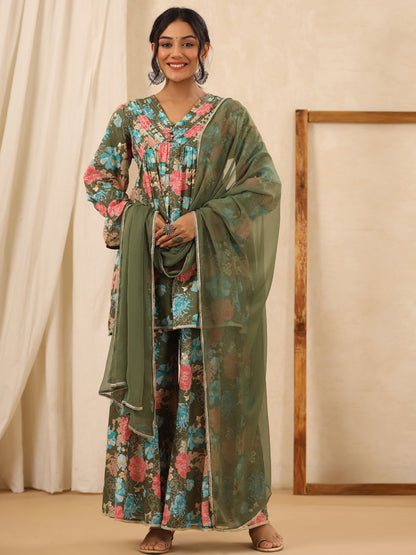 Flared Style Cotton Fabric Green Color Kurta And Bottom With Dupatta