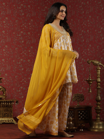 Flared Style Mulmul Cotton Fabric Mustard Color Kurta And Sharara With Dupatta