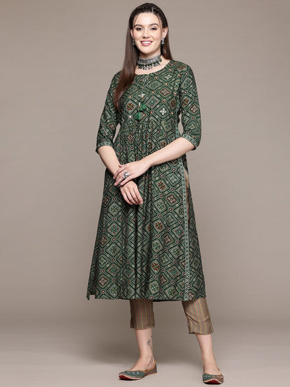 Flared Style Silk Fabric Green Color Kurta With Bottom