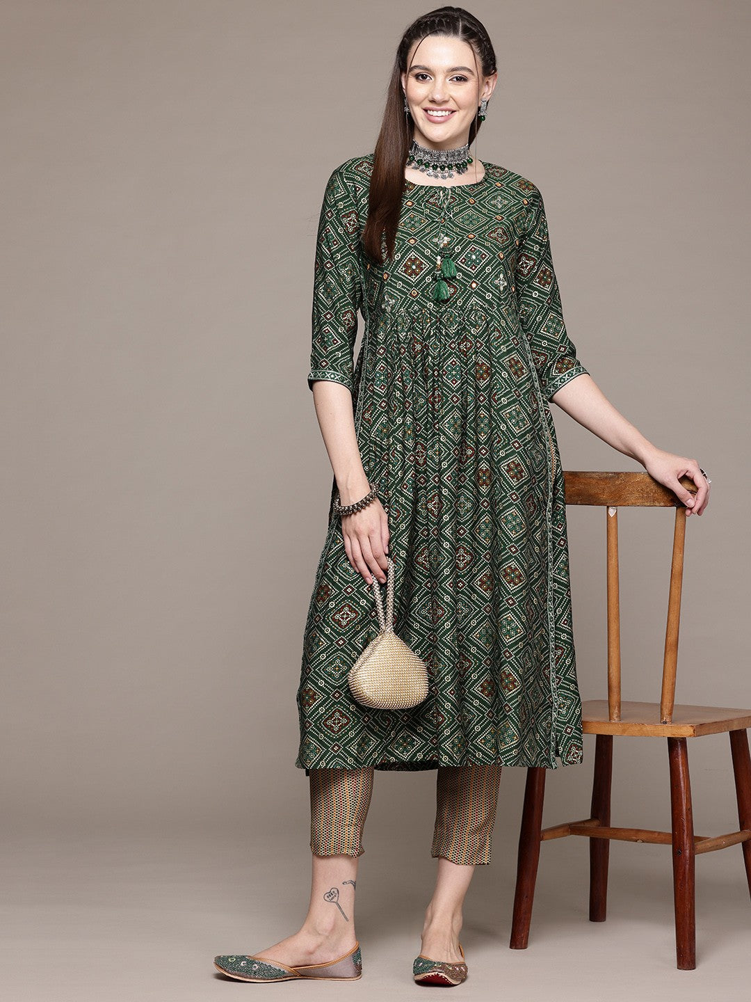 Flared Style Silk Fabric Green Color Kurta With Bottom